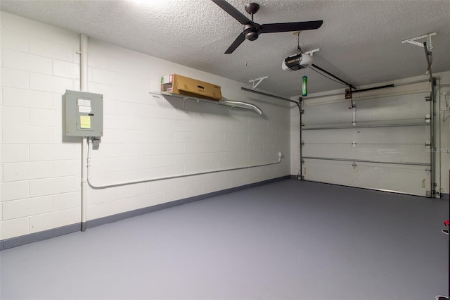 10918 SE 50th Ave, Belleview, FL 34420 - garage featuring ceiling fan, a garage door opener, and electric panel