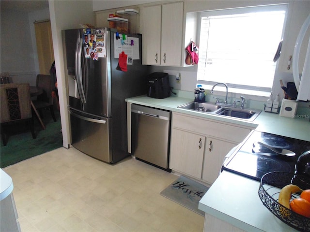 kitchen featuring stainless steel appliances and sink