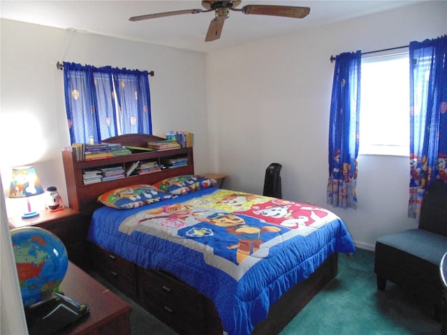 bedroom featuring ceiling fan and carpet flooring