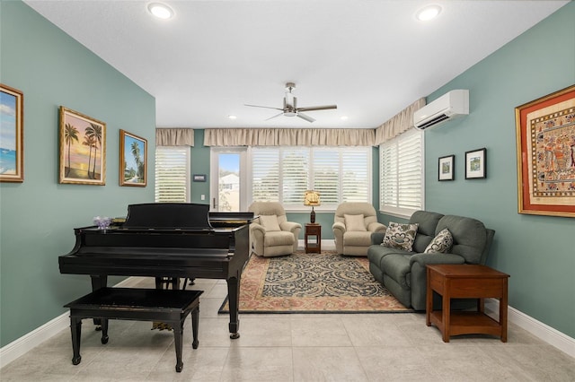 interior space with an AC wall unit, light tile patterned floors, and ceiling fan