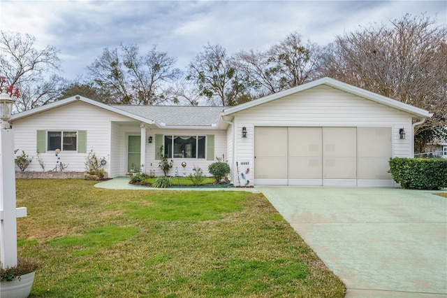 single story home with a front yard and a garage