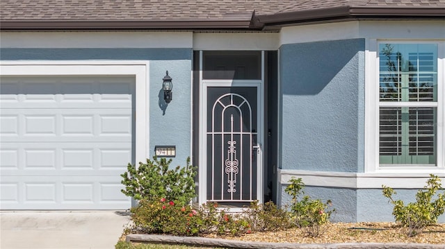 property entrance featuring a garage