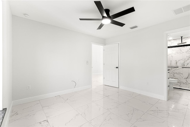 empty room featuring ceiling fan