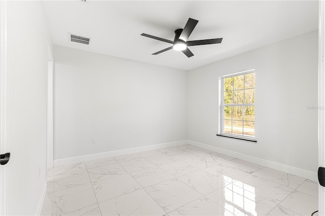 spare room featuring ceiling fan