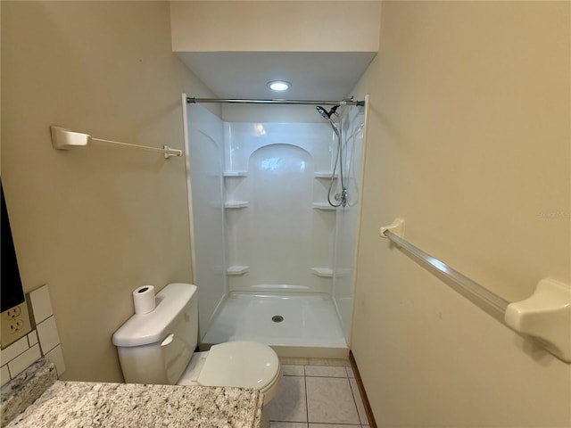 full bathroom with a shower, toilet, and tile patterned floors