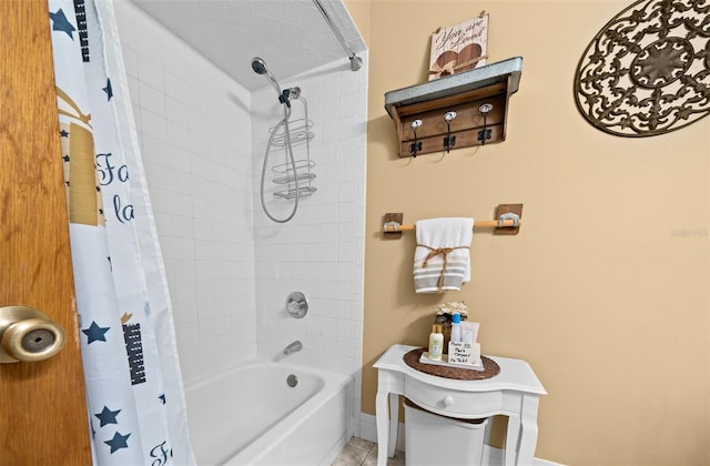 bathroom featuring shower / bath combination with curtain and tile patterned floors