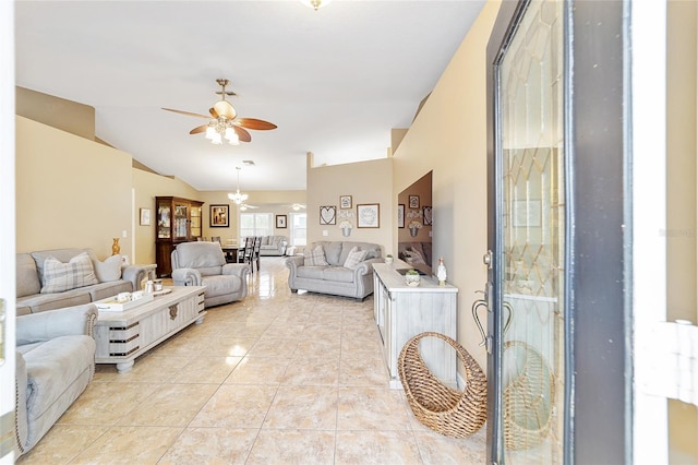 tiled living room featuring vaulted ceiling and ceiling fan