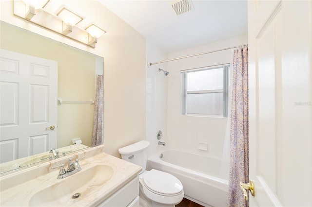 full bathroom with toilet, shower / tub combo, and vanity