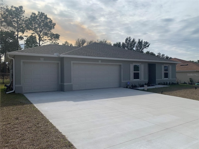 single story home with a garage