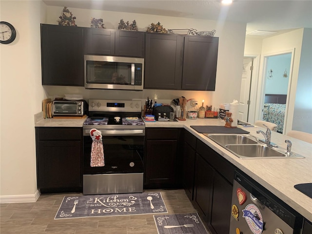 kitchen with sink and stainless steel appliances