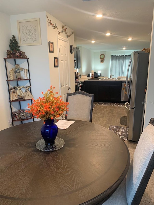 dining area featuring sink