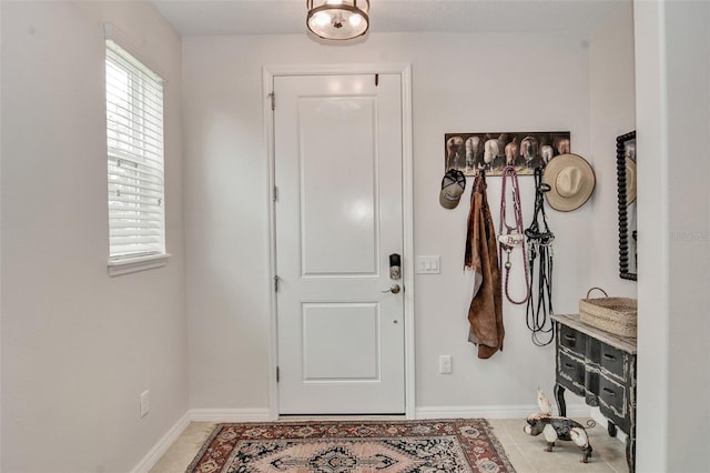 entryway featuring light tile patterned floors