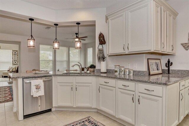 kitchen with white cabinetry, kitchen peninsula, ceiling fan, stainless steel dishwasher, and sink