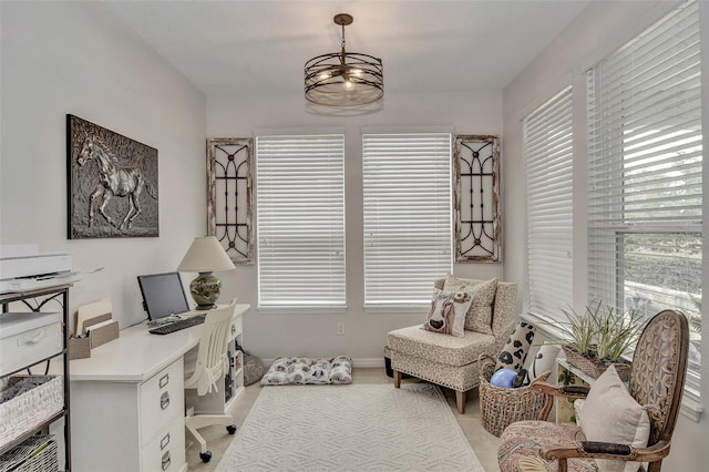 office space featuring a notable chandelier