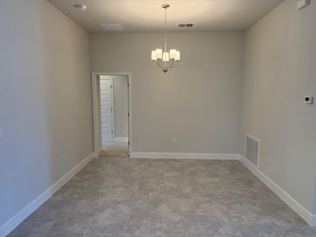 2158 NW 23rd Loop, Ocala, FL 34475 - empty room featuring visible vents, baseboards, and an inviting chandelier
