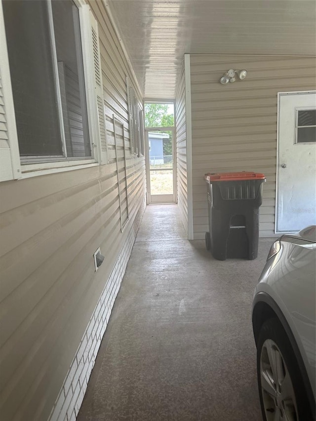 480 NE 64th Ave, Ocala, FL 34470 - hall with carpet flooring and wooden walls