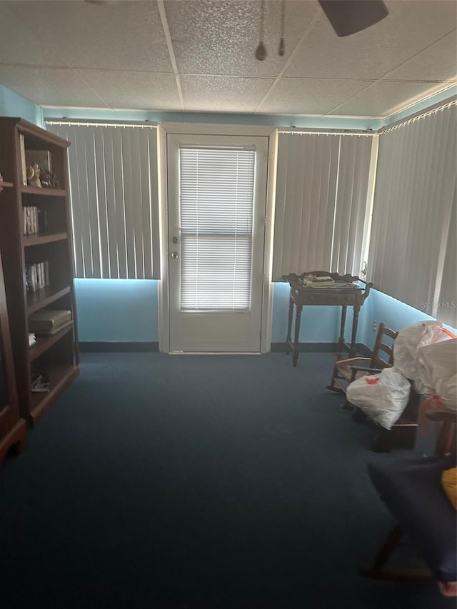 480 NE 64th Ave, Ocala, FL 34470 - living area featuring a drop ceiling and carpet