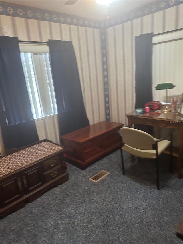 480 NE 64th Ave, Ocala, FL 34470 - living area with wallpapered walls, carpet flooring, and ceiling fan