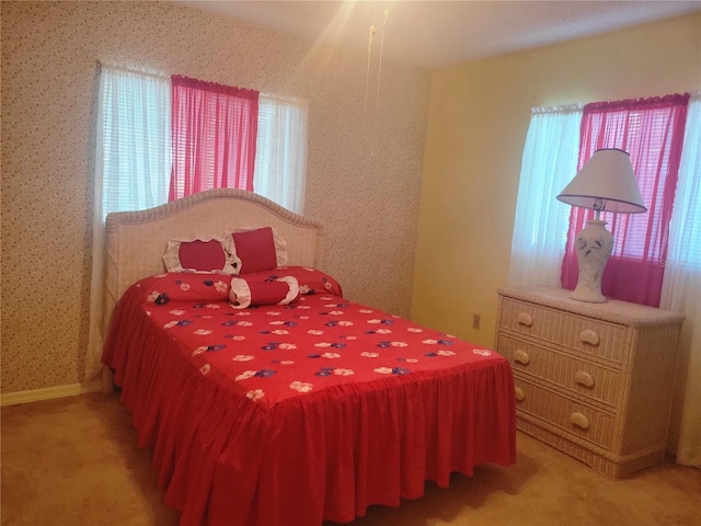 10800 SW 62nd Ave, Ocala, FL 34476 - bedroom with light carpet and multiple windows