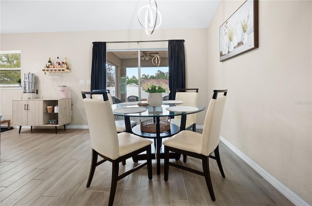 dining room with wood-type flooring