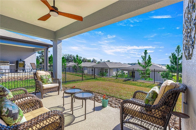 view of patio with ceiling fan