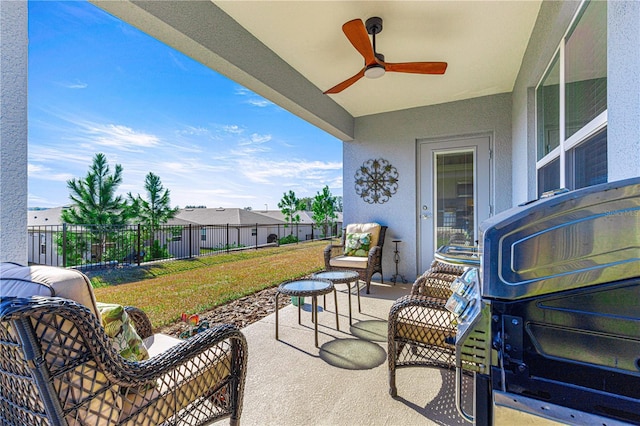 view of patio with ceiling fan