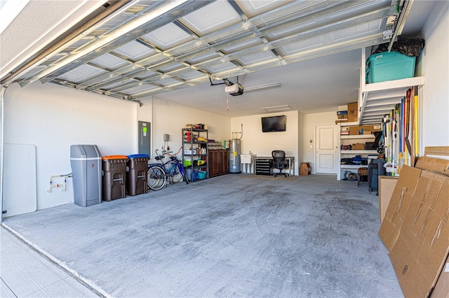 garage with electric panel, water heater, and a garage door opener