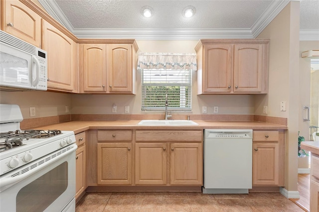 kitchen with sink, white appliances, ornamental molding, a textured ceiling, and light brown cabinets