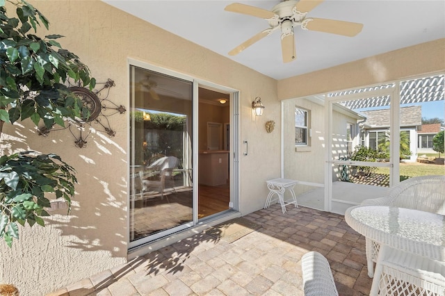 view of patio with ceiling fan