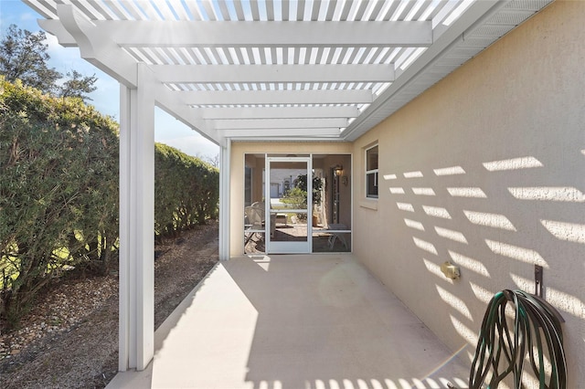 view of patio / terrace featuring a pergola