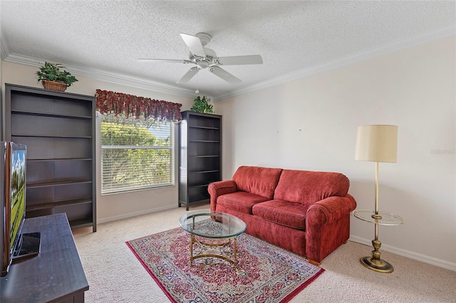 living room with light carpet, ceiling fan, crown molding, and a textured ceiling