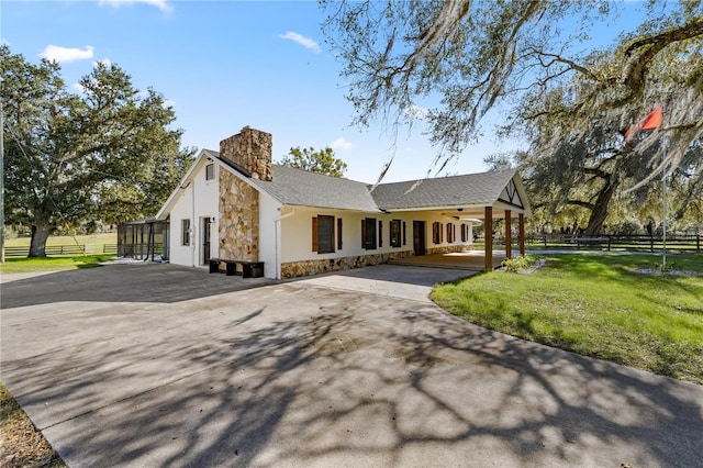 view of property exterior featuring a yard