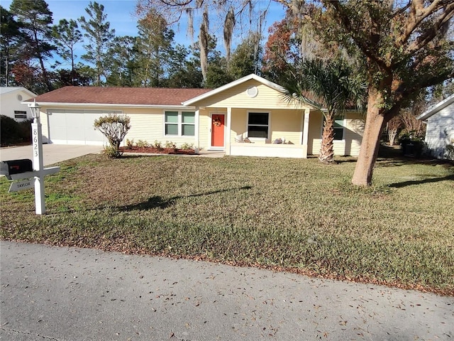 single story home with a garage and a front yard