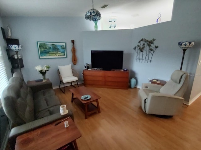 living room with hardwood / wood-style flooring