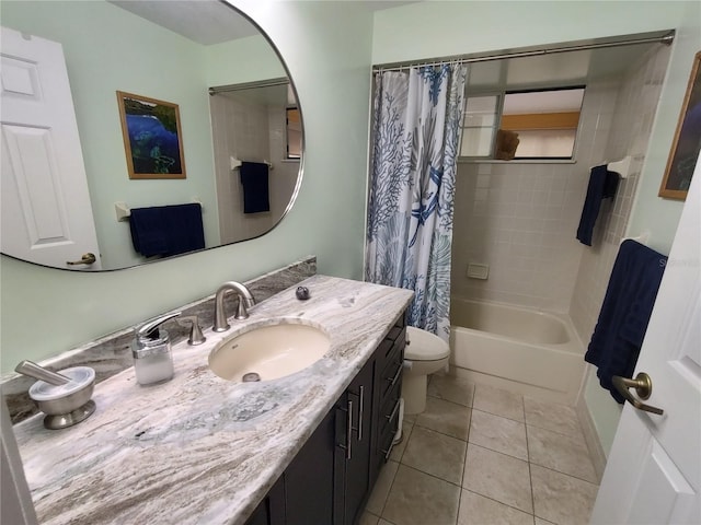 full bathroom with toilet, vanity, shower / tub combo with curtain, and tile patterned floors