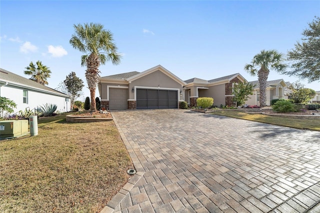 ranch-style house with a front lawn and a garage