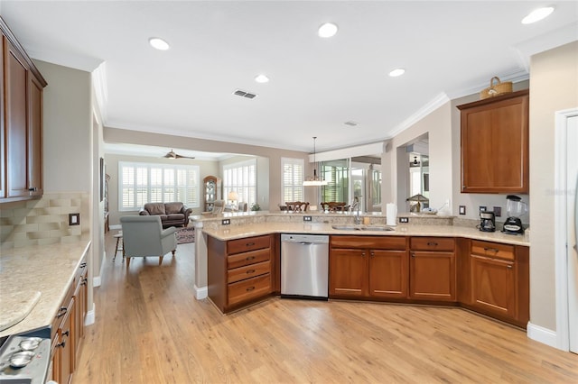 kitchen featuring ceiling fan, light hardwood / wood-style floors, stainless steel dishwasher, sink, and ornamental molding