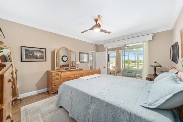 bedroom featuring light wood-type flooring, ceiling fan, and crown molding