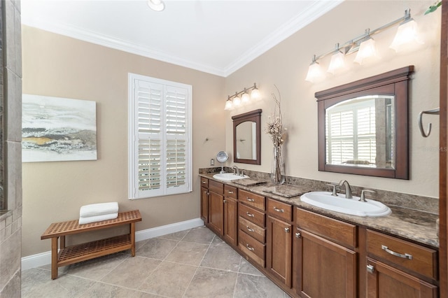 bathroom featuring tile patterned floors, vanity, and crown molding