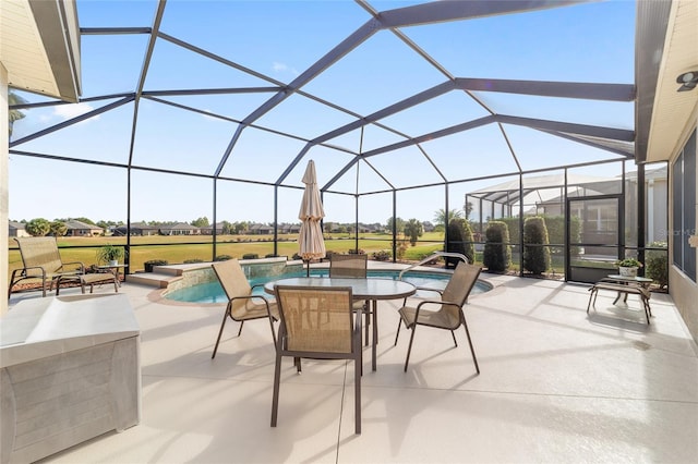 view of patio / terrace with glass enclosure