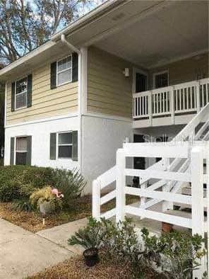 view of side of property featuring a balcony