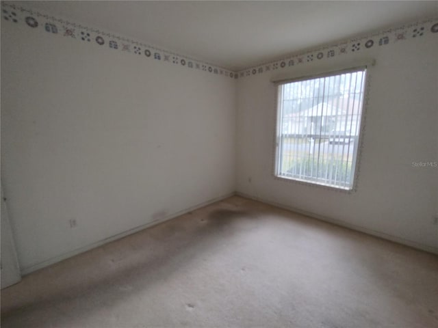 view of carpeted spare room