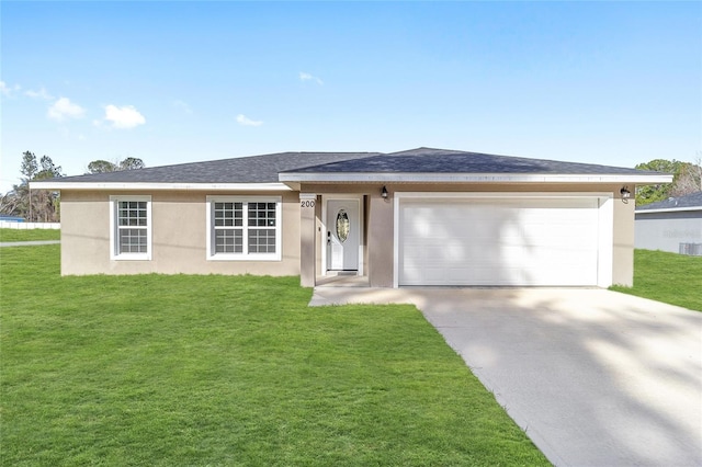 ranch-style home featuring a garage and a front yard