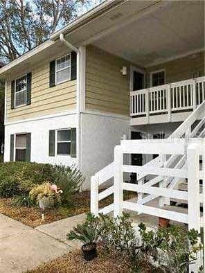 view of property exterior featuring a balcony