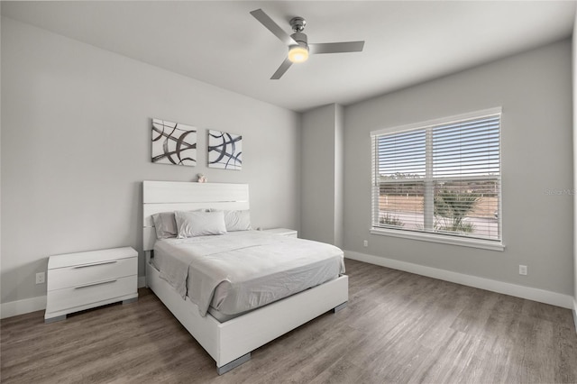 bedroom featuring ceiling fan and wood-type flooring