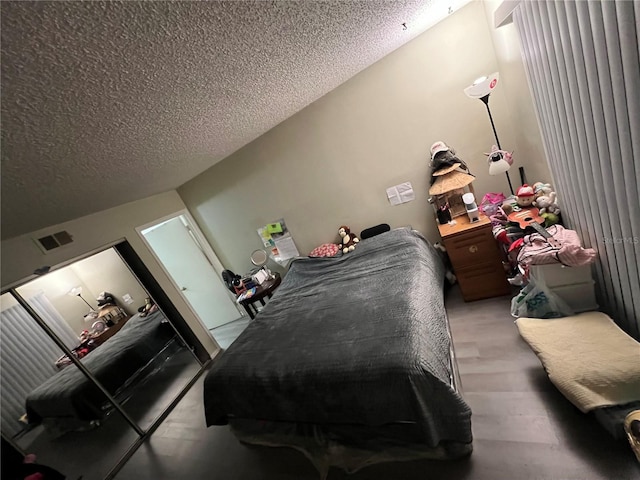 bedroom with a textured ceiling