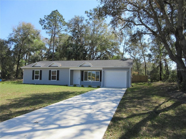 ranch-style home with a garage, driveway, and a front lawn