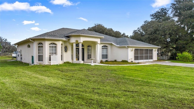 view of front of home with a front lawn