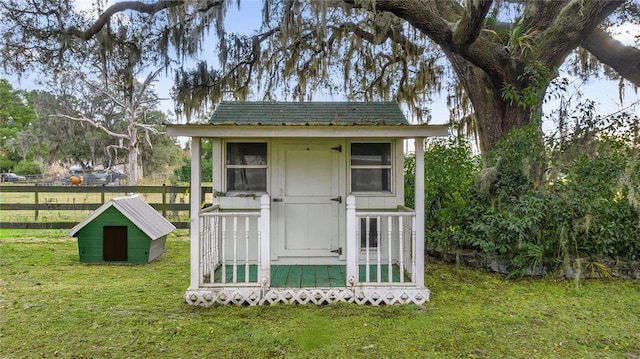 view of outdoor structure featuring a yard