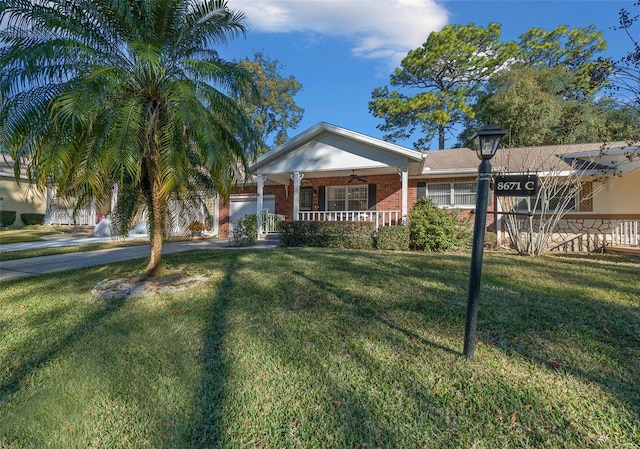 view of front of home with a front lawn and a porch